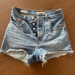Levi's Blue Jean Shorts with High-Waisted Cut and Raw Hem